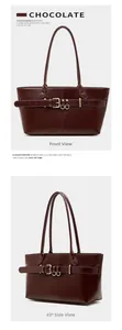 Detail view of deep chocolate leather tote bag with gold buckle and pebble texture