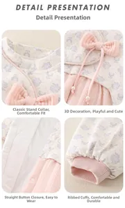 Macro details of baby floral bodysuit showing stand collar, bow, buttons, and ribbed cuffs