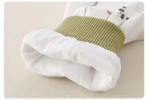 Detail of baby romper ribbed cuffs with cute panda print and soft cotton texture