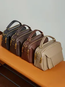 Sac à main minimaliste en cuir pleine fleur avec double fermeture éclair en quatre tons