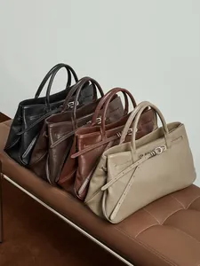 Sac cabas minimaliste en cuir véritable en quatre couleurs avec boucles de ceinture latérales