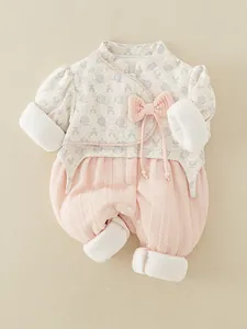 Floral baby romper with pink bow and plush trim for newborn girls winter comfort