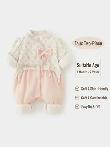 Floral baby girl romper with pink bow and ribbed knit texture for infants 0-18 months