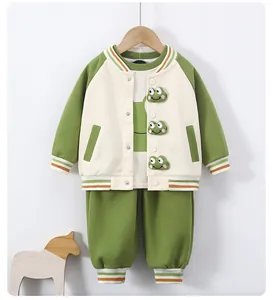Detail of baby boy baseball jacket set featuring three 3D frog buttons and rib-knit cuffs