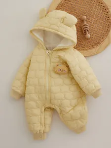 Quilted light yellow hooded baby romper with cute bear ears and plush brooch detail