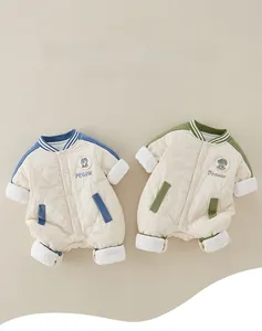 Detail of baby quilted romper featuring ribbed collar and cute animal embroidery