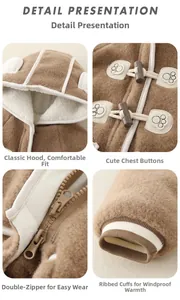 Detail view of baby winter coat with horn buttons, dual zippers, and ribbed windproof cuffs