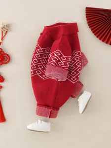 Red knit baby romper with traditional Chinese knots and festive patterns for Lunar New Year