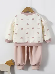 Toddler girl two-piece heart print sweatshirt and pink pants set for spring wear