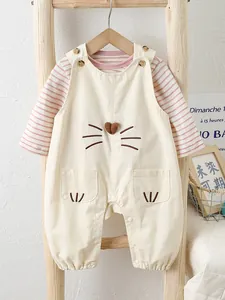 Baby girl 2-piece set with striped long sleeve shirt and beige cat overalls for spring