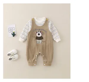 Detailed flat lay of brown velvet infant overalls with cartoon puppy and striped shirt