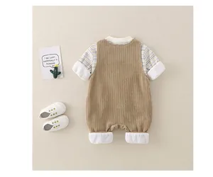 Flat lay back view of baby corduroy overalls and striped long sleeve set on cream background