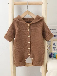 Brown teddy fleece hooded romper for babies with wood-style buttons and rolled cuffs