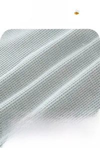 Close-up of Class A light blue waffle knit fabric for breathable and soft baby clothing