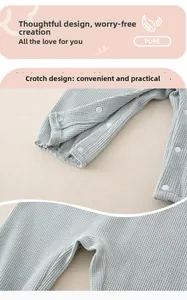 Detail of baby waffle knit romper with convenient crotch snap buttons for diaper changes