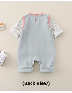 Detail view of baby striped romper featuring waffle texture fabric and back button closure