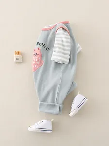 Cute infant romper with light blue waffle fabric and pink cat embroidery detail