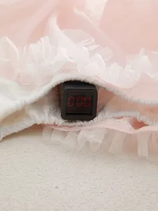 Pink cotton baby bodysuit skirt undergoing formal safety test for zero formaldehyde