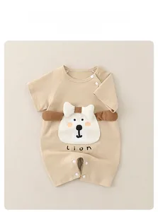 Detailed view of baby lion romper with soft 3D ears and snap button shoulders