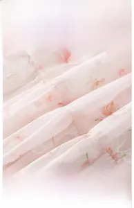 Detail of pink floral embroidery on breathable Grade A infant safety standard fabric