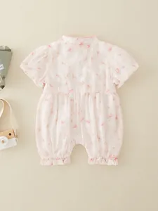 Pink newborn floral romper with Chinese style embroidery and soft tulle ruffles