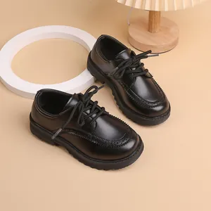 Classic boys black brogue leather shoes with lace-up design for school and performance