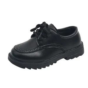 Classic boys black leather brogue shoes with lace-up design and non-slip rubber soles