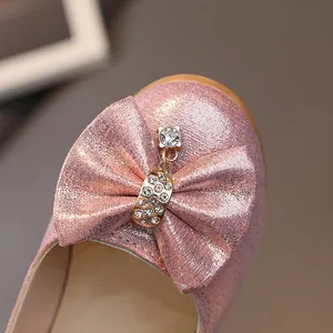 Ballerine glitter rosa da bambina con fiocco di strass e suola in gomma resistente