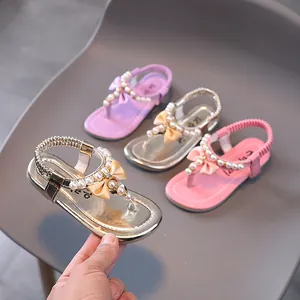 Sandalias de Princesa para Niñas con Perlas y Lazo Suela Blanda Antideslizante Zapatos de Verano de Playa Oro Rosa Violeta con Strass y Cuentas para Niñas