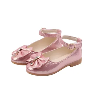 Pink glitter Mary Jane shoes for girls with bow and rhinestone pendant detail