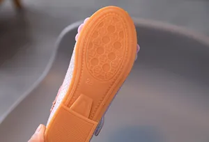 Detail of soft rubber non-slip sole for girl princess shoes with size 28 marking