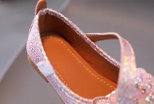 Detail of pink sequin girl's flats with premium lining and precise stitching detail