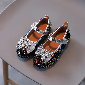 Sparkly girls Mary Jane princess shoes with sequin finish and rhinestone butterfly detail