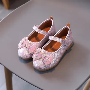 Pink holographic glitter Mary Jane shoes for girls with decorative floral bow ornament
