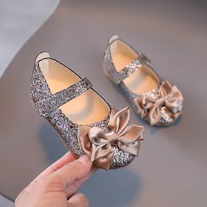 Glitzernde champagnerfarbene Mary Jane Schuhe für Mädchen mit Satinschleife und Klettverschluss