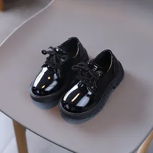 Classic black patent leather lace-up shoes for boys with round toe and anti-slip sole