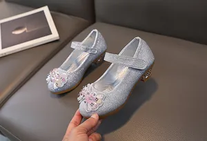 Silver sequin Mary Jane shoes for girls with rhinestone bow and low heel for parties