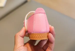 Close-up of pink faux leather toddler shoe heel with durable non-slip rubber sole