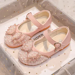 Pink princess Mary Jane shoes with pearls, rhinestones, and double bows for girls