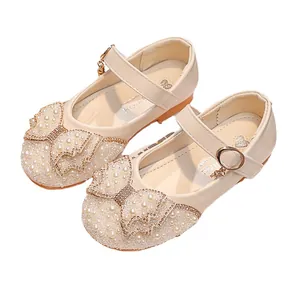 Sparkly girls princess shoes with faux pearls, glitter bow and gold heart buckle