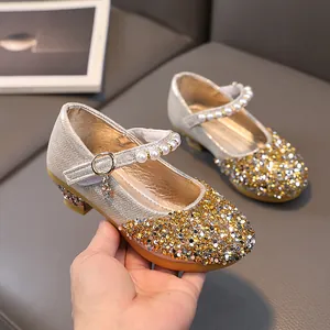 Girl's sparkly gold Mary Jane princess shoes with sequins and pearl strap for parties