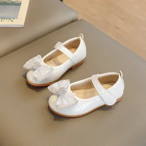 White Mary Jane shoes for girls with rhinestone bow and woven texture surface