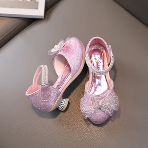 Pink sequin princess sandals for girls featuring sparkling rhinestones and lace bow details