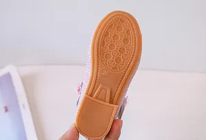 Detail of durable non-slip rubber sole with size 28 marking for girls princess shoes