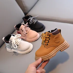 Classic children's non-slip lace-up martin boots in brown, white, pink and black colors