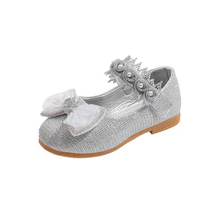 Sparkly silver sequin princess shoes for girls with lace bow and pearl crown details