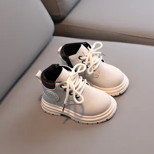 Classic beige children's Martin boots with thick anti-slip soles and side zipper