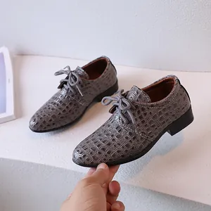 Dark grey boys' lace-up dress shoes with crocodile texture and non-slip rubber soles
