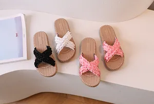 Flat slides with ruffled cross-straps and woven texture footbed in multiple colors
