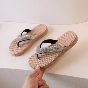 Women's flip flops with glitter straps and woven textured non-slip soles for beach wear